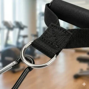 Detailed view of the stainless steel D-ring attachment on durable exercise tubing handles