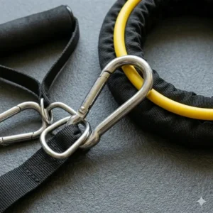 Stainless steel carabiner clips used to connect various resistance tube accessories and modify resistance levels.