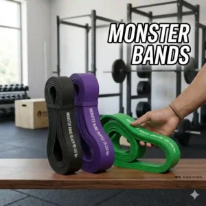 Athlete performing a glute activation workout on a gym mat using a pink monster bands.